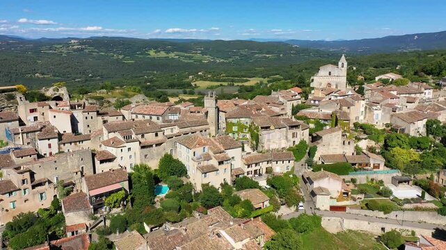 View of Saignon village in France, discover the stunning architecture of the ancient Saignon village in southern France. Provence, Vaucluse, France.