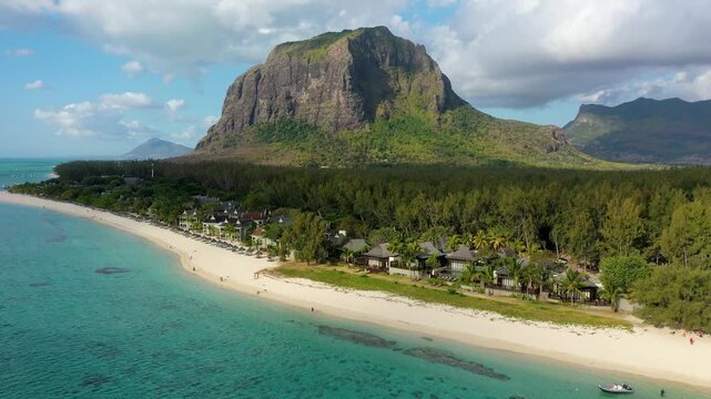 Tropical scenery, beautiful beaches of Mauritius island, Le Morne, popular luxury resort. Le Morne beach luxury resorts, Mauritius. Luxury beach in Mauritius, sandy beach with palms and blue ocean.