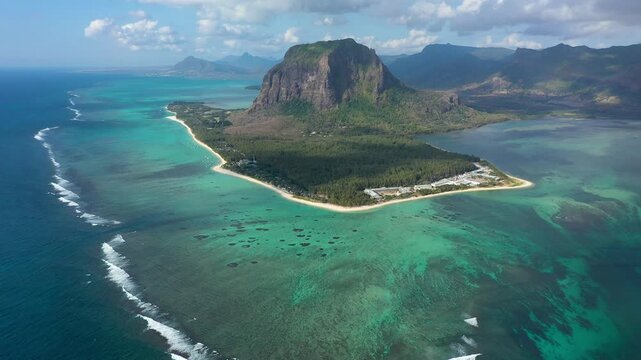 Aerial view of Mauritius island panorama and famous Le Morne Brabant mountain, beautiful blue lagoon and underwater waterfall. Le Morne Brabant peninsula and Underwater Waterfall, Mauritius.