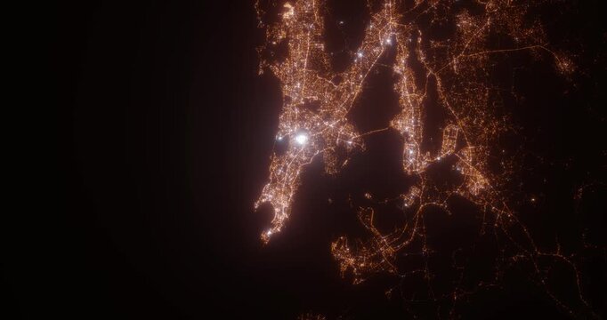 Mumbai (India) aerial view at night. Top view on modern city with street lights. Camera is zooming out, rotating clockwise