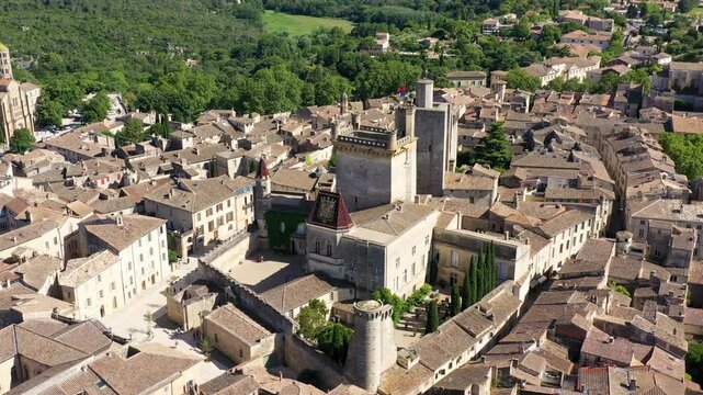 View of beautiful town of Uzes, Gard department, France. Aerial view of the historic town of Uzes, France. Historic town of Uzes with stunning aerial views of its medieval architecture, Gard, France.