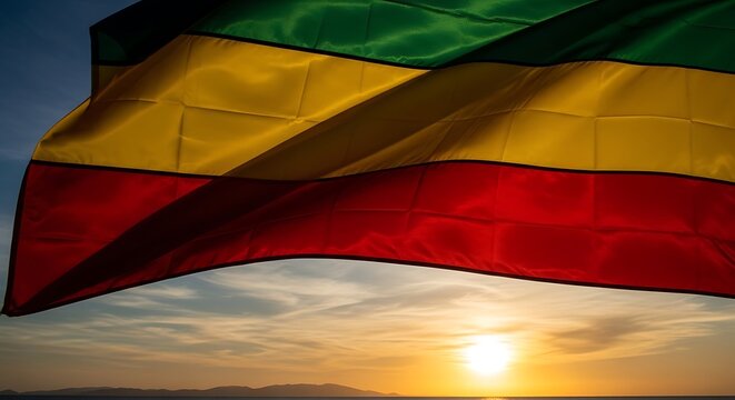 Juneteenth and black history month celebrating freedom and resilience with the pan african flag at sunset