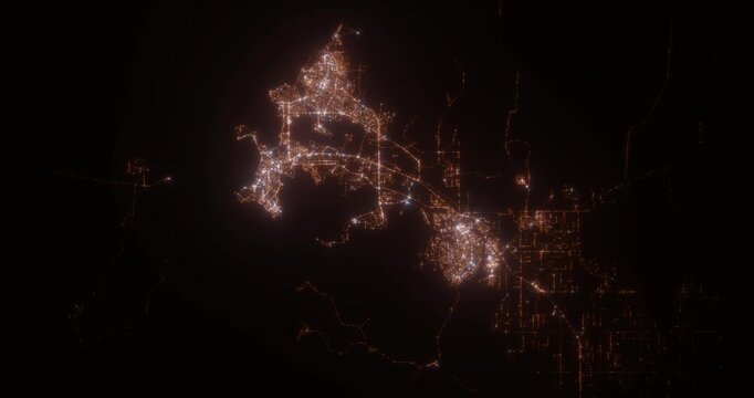 Darwin (Australia) aerial view at night. Satellite view on modern city with street lights. Camera is flying above the city, moving forward