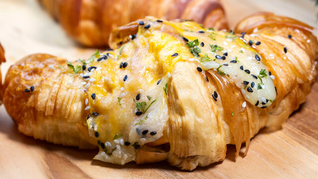 butter croisan with cream topping on plate