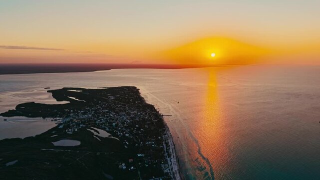 Aerial drone view of sunset along the coastline in Holbox Island, Mexico &ndash; tropical Caribbean landscape