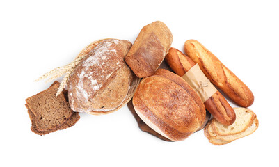 Fototapeta premium Different types of bread and spikes isolated on white, top view