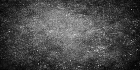 Fototapeta premium Aged dark grunge texture with a rough black and white abstract design featuring a dirty vintage concrete wall surface and grey stone pattern