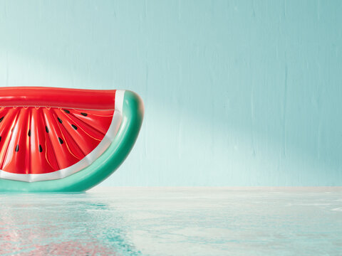 Watermelon inflatable floating on water. Summer background with copy space. 3D Rendering, 3D Illustration