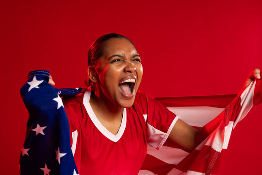 African American woman shouting and holding U