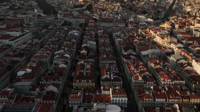 Cinematic Aerial View of Lisbon City Center and Main Squares at Sunset 