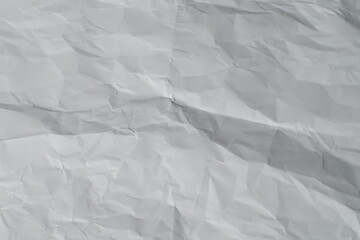 Obraz premium Close up of completely crumpled white paper texture