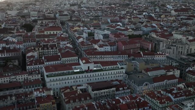Cinematic Aerial View of Lisbon City Center and Main Squares at Sunset 