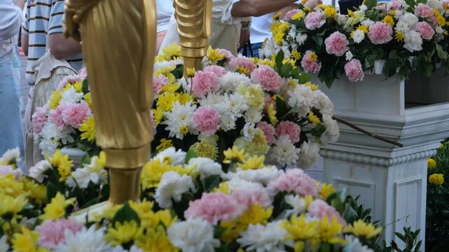 Pouring water over Buddha to receive blessings during Songkran Festival, Buddhist Thai New Year. Songkran is inscribed as the UNESCO&rsquo;s Intangible Cultural Heritage event for Humanity from Thailand.
