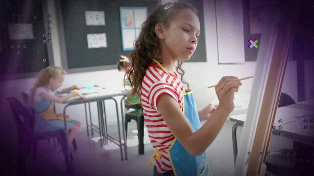 Cam panning girl painting at easel dipping brush making school art while purple overlays obscuring