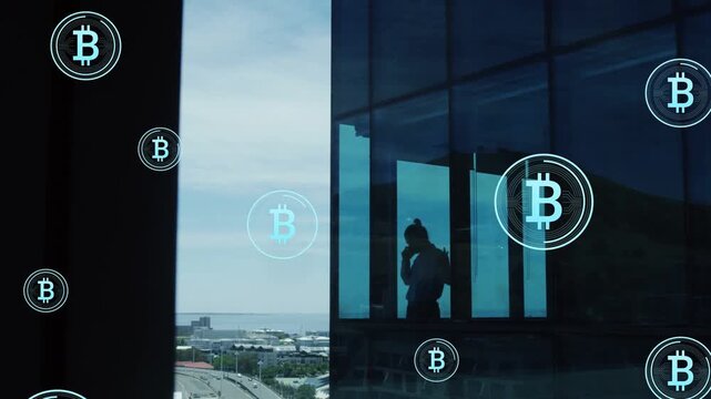 Boy holding phone in glass room, call causing Bitcoin icons floating over city, tracking crypto