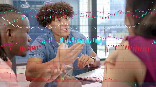 Center man leading finance meeting, typing on laptop, causing animated charts rising around papers