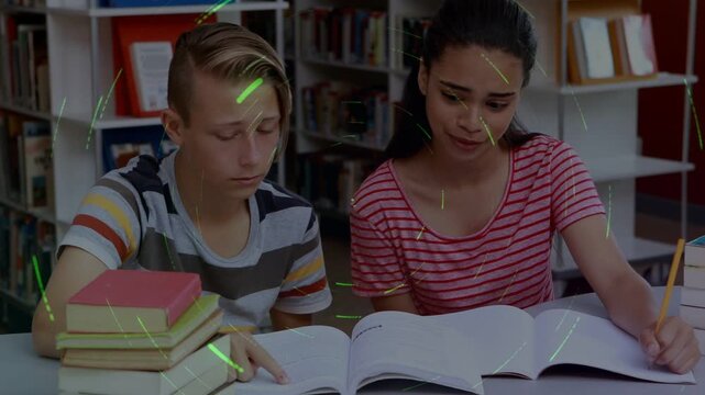 Vertical video: Pointing two teens studying at library in stripes using book, pencils, light specks