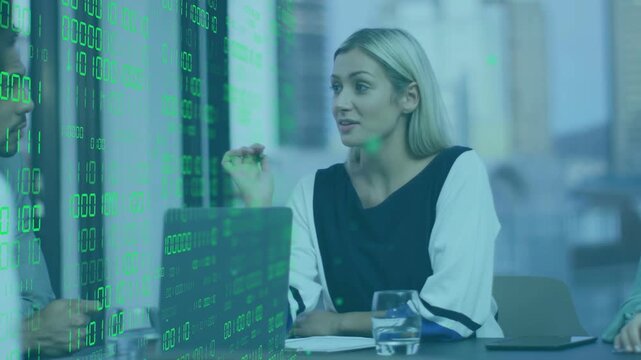 Woman starting mtg, gesturing, studying team as glass showing green code guiding data discussion