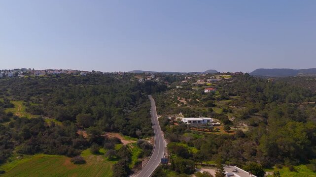 Aerial Drone View Following Uphill Road into Akamas Peninsula Highlands near Latsi Cyprus
