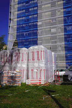 THIERS, FRANCE - MARCH 31, 2026: Building facade renovation with scaffolding and insulation materials