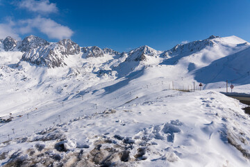 Naklejka premium Pas de la Casa is a prominent ski sector of Grandvalira in Andorra, characterized by being the highest point , with a great guarantee of snow, wide slopes and a young and lively atmosphere.