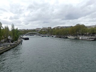 Obraz premium Paris, April 2026 : Visit of the magnificent city of Paris, Capital of France - View on different facades of buildings built by Baron Haussmann