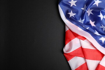 Obraz premium USA flag on black background, top view. Space for text