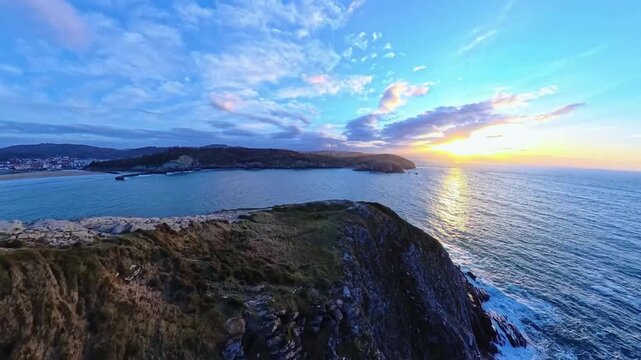 Aerial View of Coastal Capeand Sea Bay at Golden Sun lare Sunset