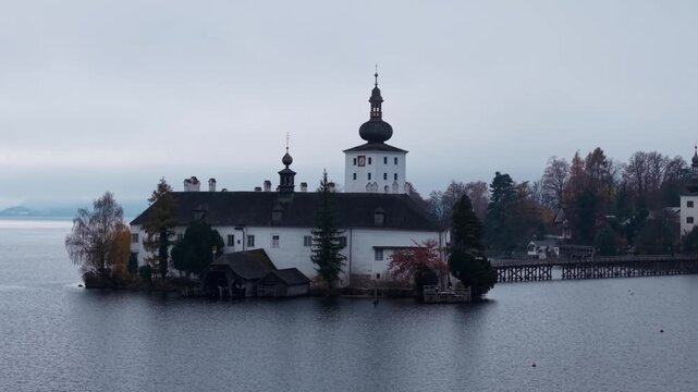 Scenic Aerial View of Histoical Palace Castle on an Iland in a Calm Lake