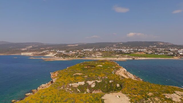 Aerial Drone View Panning Back from Geronisos Island Cyprus with Flying Seagulls
