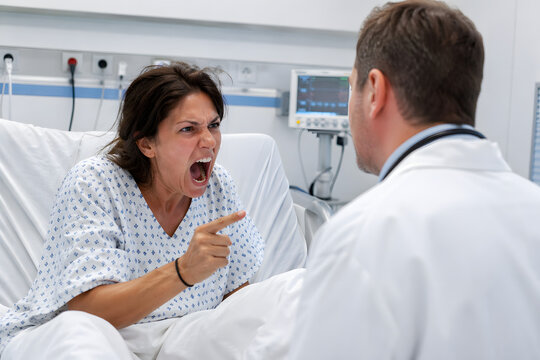 Aggressive patient shouting at doctor in hospital bed, intense emotional confrontation in clean clinical setting, healthcare conflict, stress and crisis situation, high realism.
