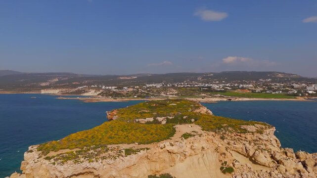 Drone Flight Over Geronisos Island and Coastal Town of Agios Georgios Pegeias