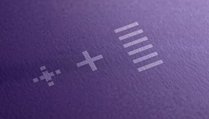 Fototapeta premium Minimalist white icons on textured purple paper surface close up