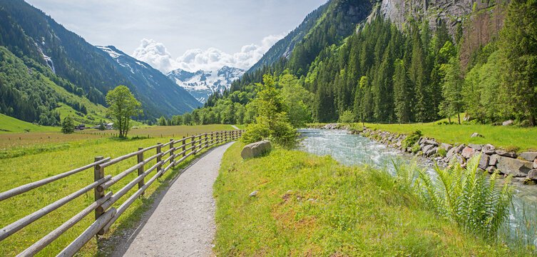hiking route beside Stillupbach creek, pictorial spring landscape near Mayrhofen, austria tyrol