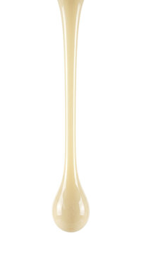 Single white chocolate sauce drip