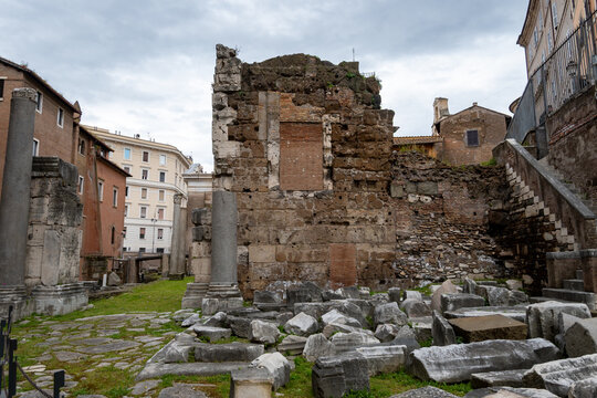 Architectural history in details of ruins, old buildings, walls, amfitheatres, arches in old part of Rome, dated from 300 BC, guided tours in Rome, Italy