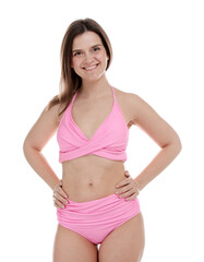 Fototapeta premium Woman in pink swimsuit on white background
