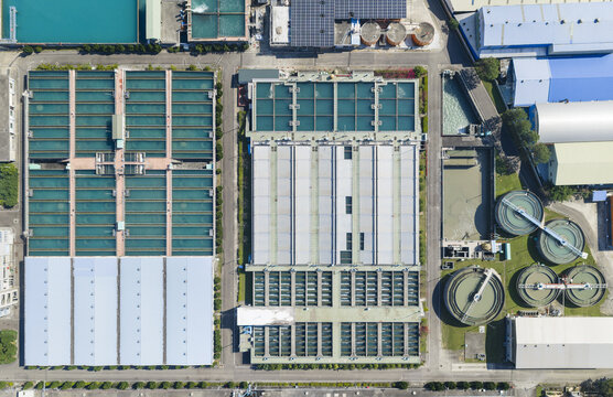 Aerial view of Water Treatment Plant with rectangular filtration tanks and circular sedimentation basins in Taiwan.