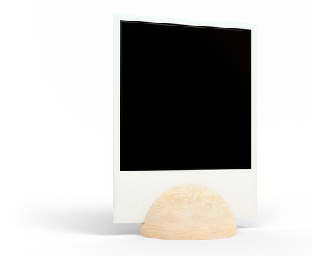 Single blank instant photo frame on a wooden hemisphere stand, side view mockup on transparent background