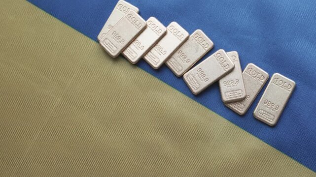 Gold Bars on Ukrainian National Flag Close-up