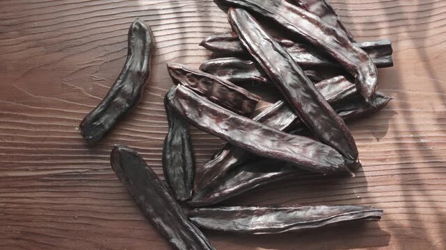 Close-up of Dried Carob Pods on Table