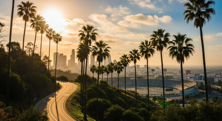 Obraz premium Iconic Los Angeles skyline at sunset with palm trees and winding road