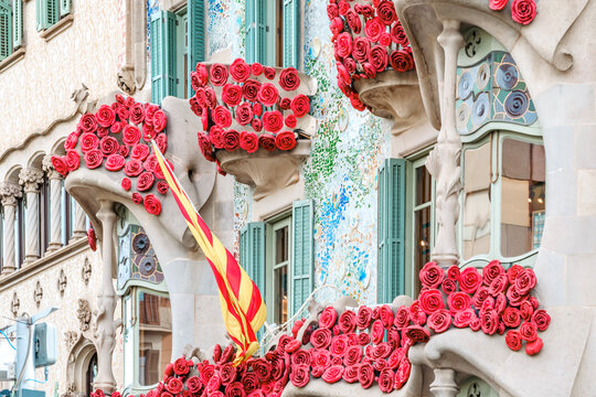 Casa Batllo Facade with Red Roses and Catalan Flag for Sant Jordi Day