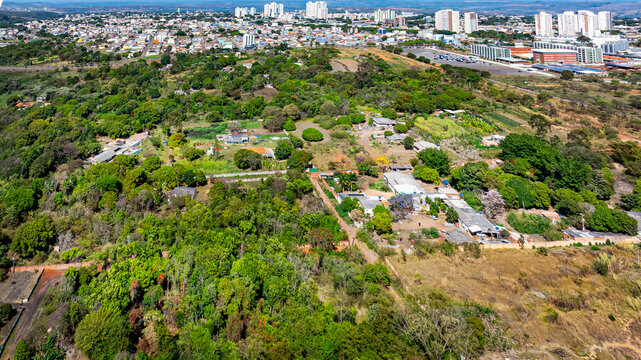 Aerial view of small farms and houses near the AMBEV brewery in the satellite city of Taguatinga. Federal District, Brazil, 2025