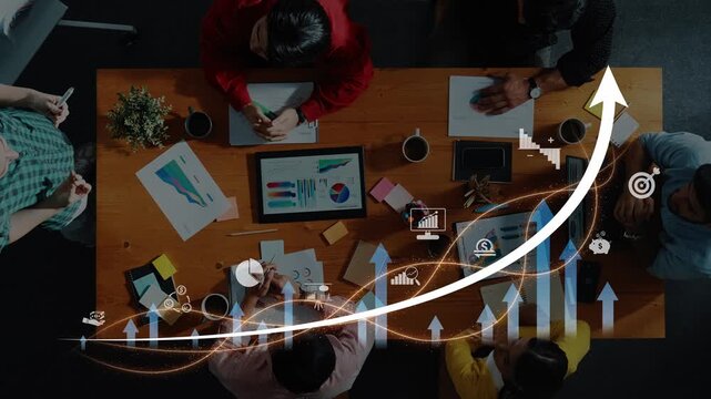 A dynamic team collaborates in a modern office setting, utilizing charts and digital data to strategize and enhance business performance and drive success. Raster