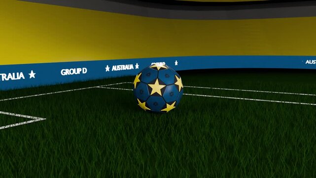 Entering from above blue soccer ball with yellow stars bouncing into penalty area, settling on turf