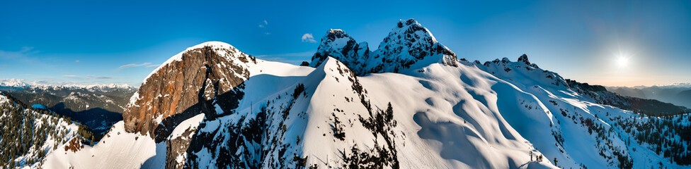 Snowy Mountain Panorama at Sunrise Over Rugged Peaks in British Columbia, Canada © edb3_16