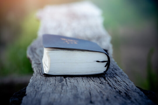 Bible on wooden plate, Christian Christianity background The struggle and victory for God
