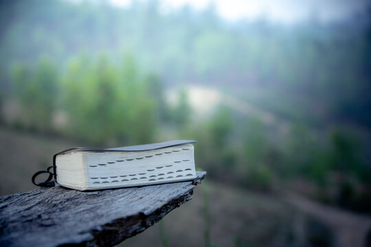 Bible on wooden plate, Christian Christianity background The struggle and victory for God