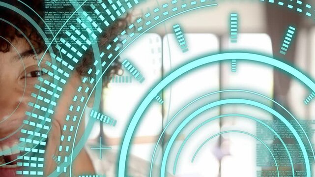 Man smiling and laughing while HUD activating, rotating teal rings, showcasing technology interface